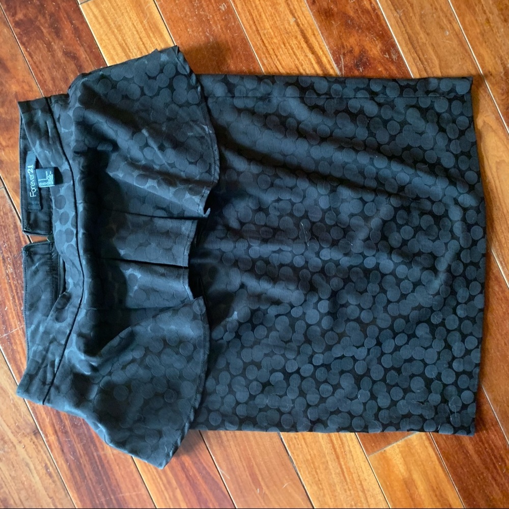 Polka dot peplum black mini skirt